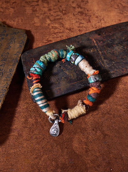 Wrapped Earth Turquoise Sterling Silver Charm Bracelet