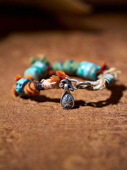 Wrapped Earth Turquoise Sterling Silver Charm Bracelet
