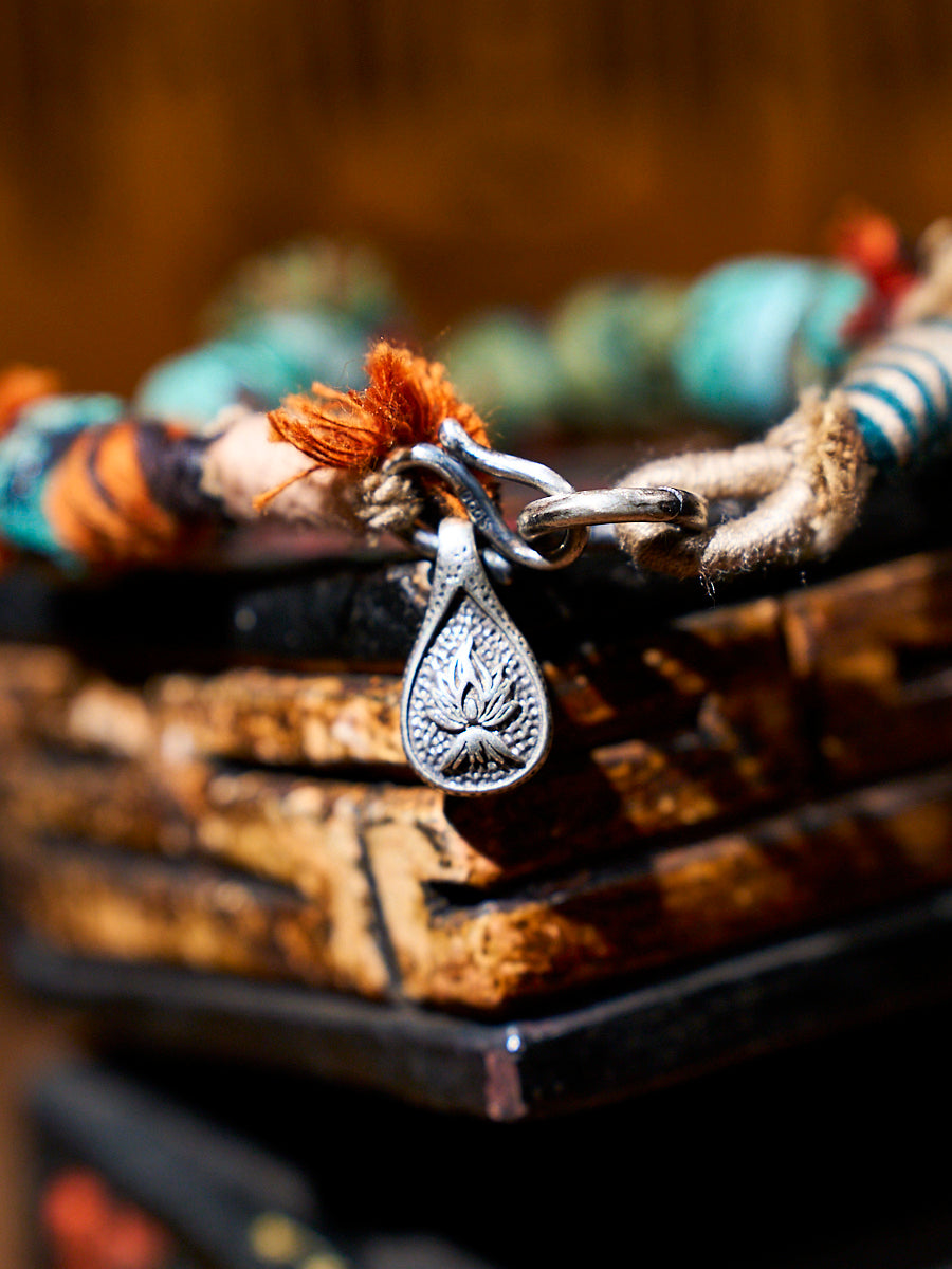 Wrapped Earth Turquoise Sterling Silver Charm Bracelet